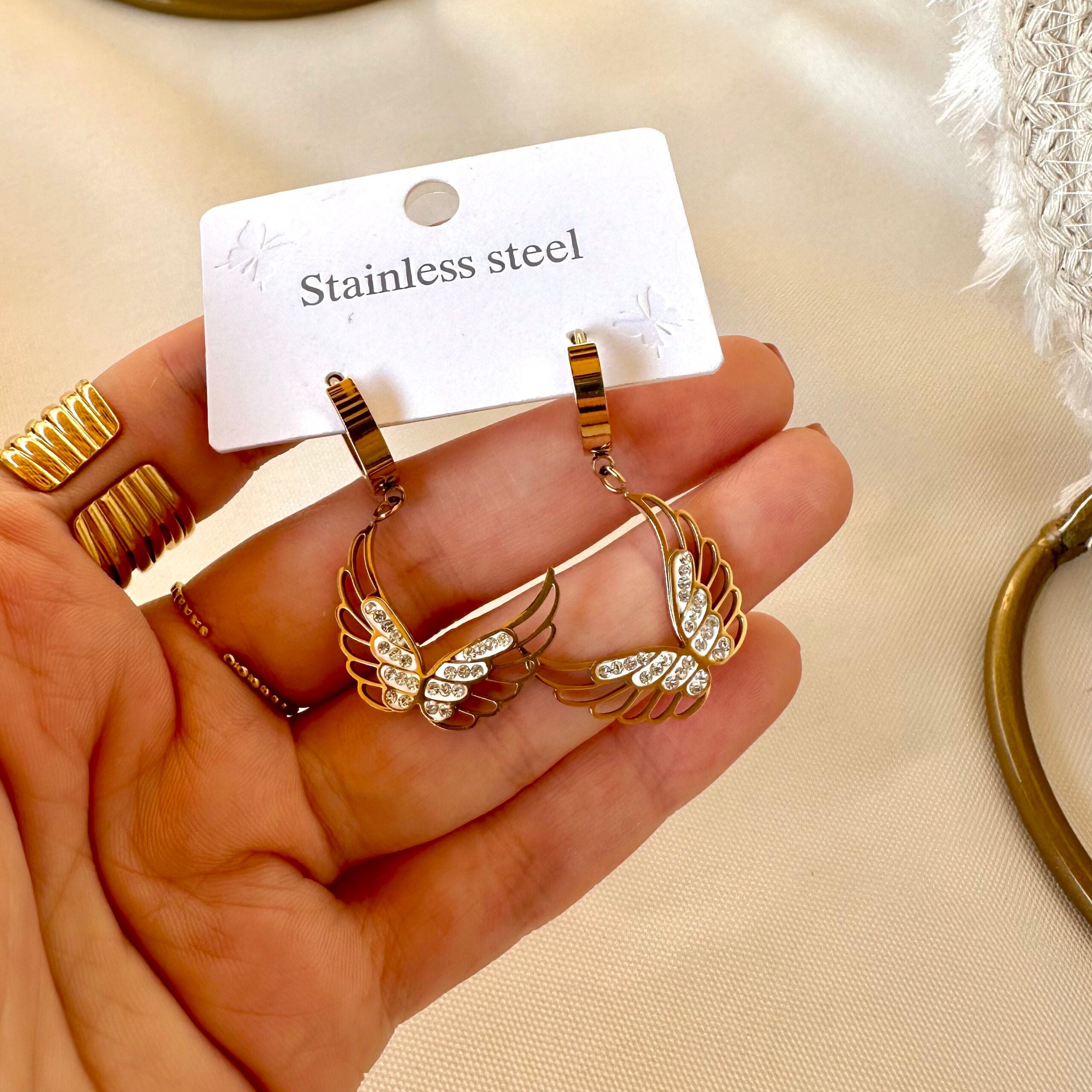 Wing zircon earrings