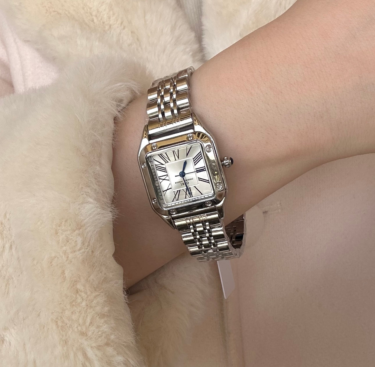 Silver square ibso watch