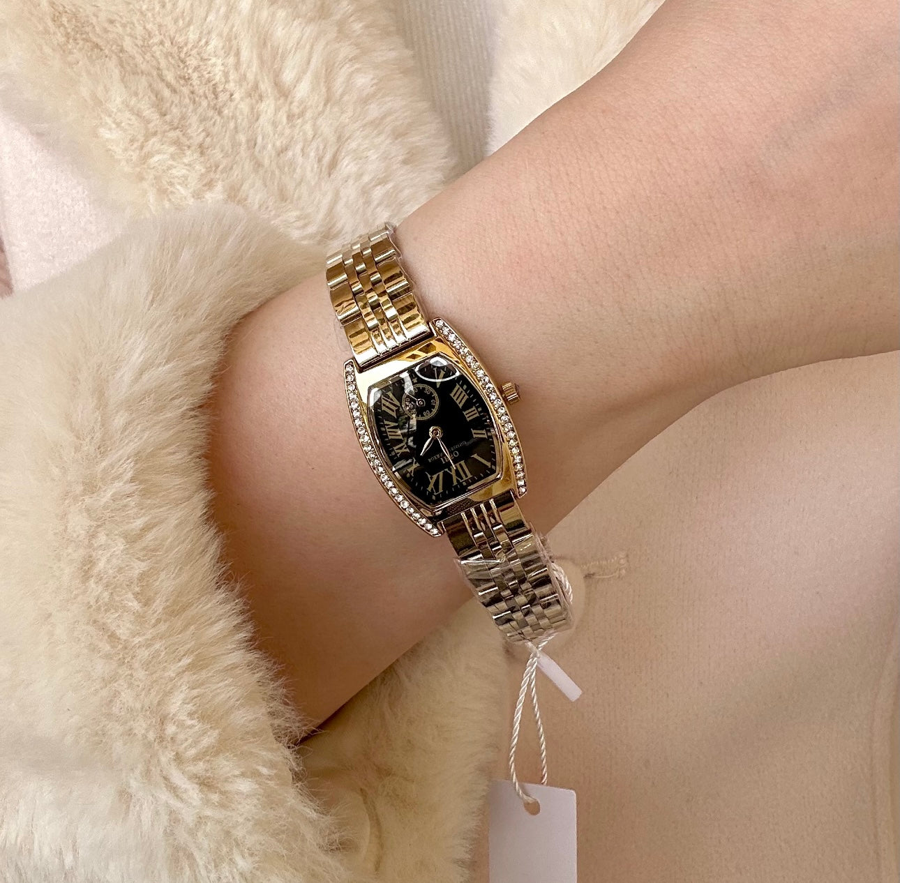 Gold and black zircon ibso watch