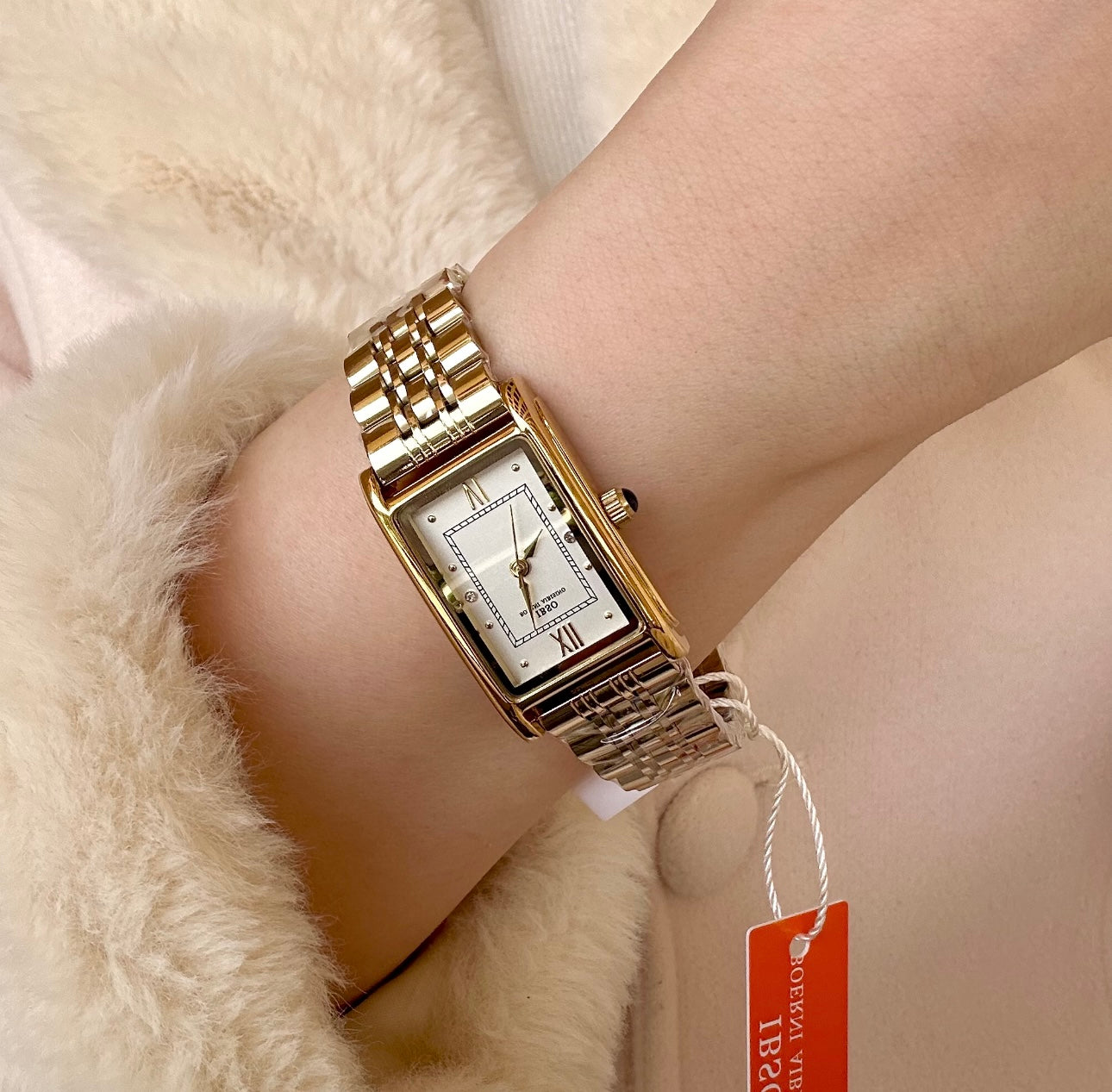 Gold and white ibso watch