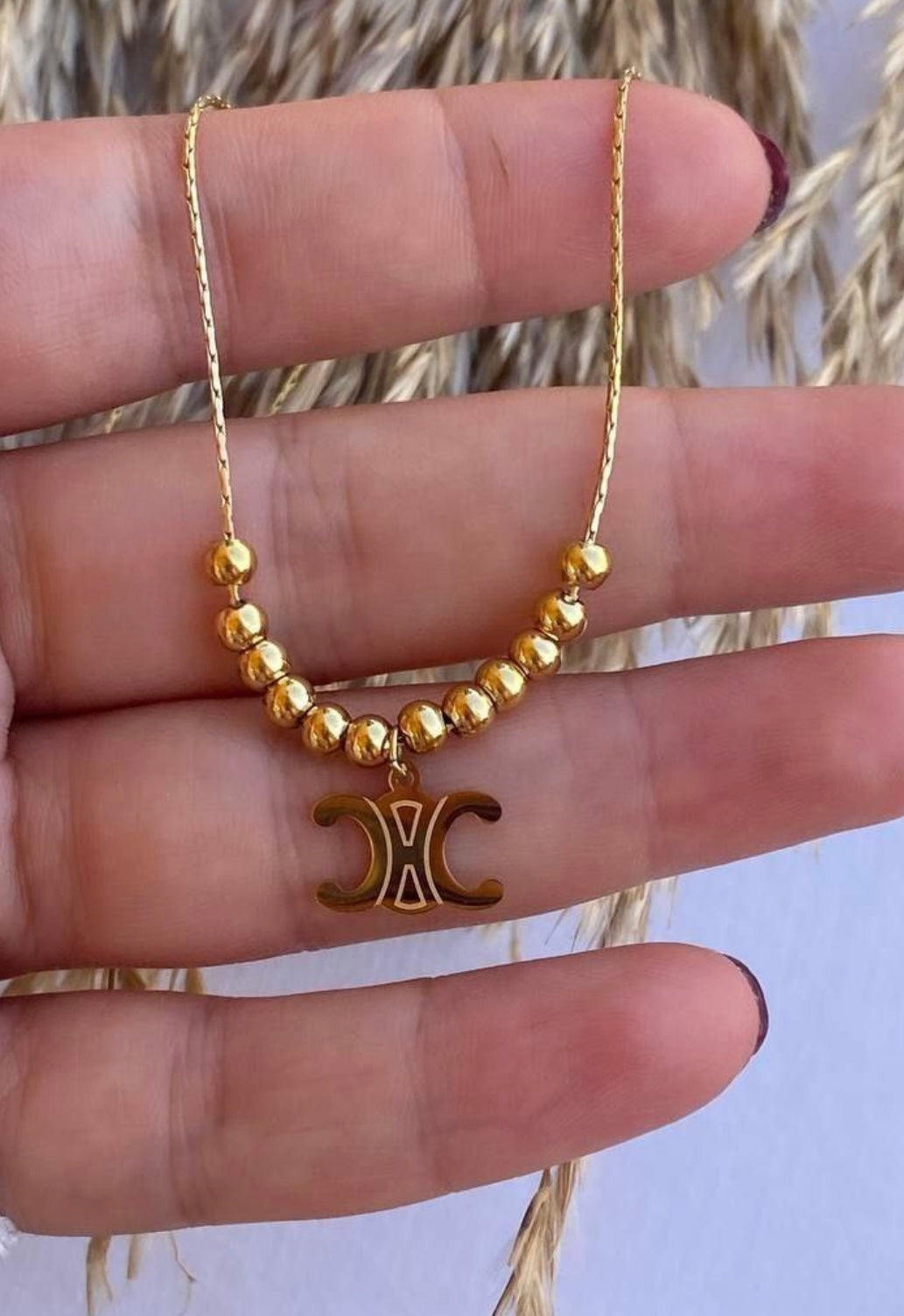 Chanel ball necklace