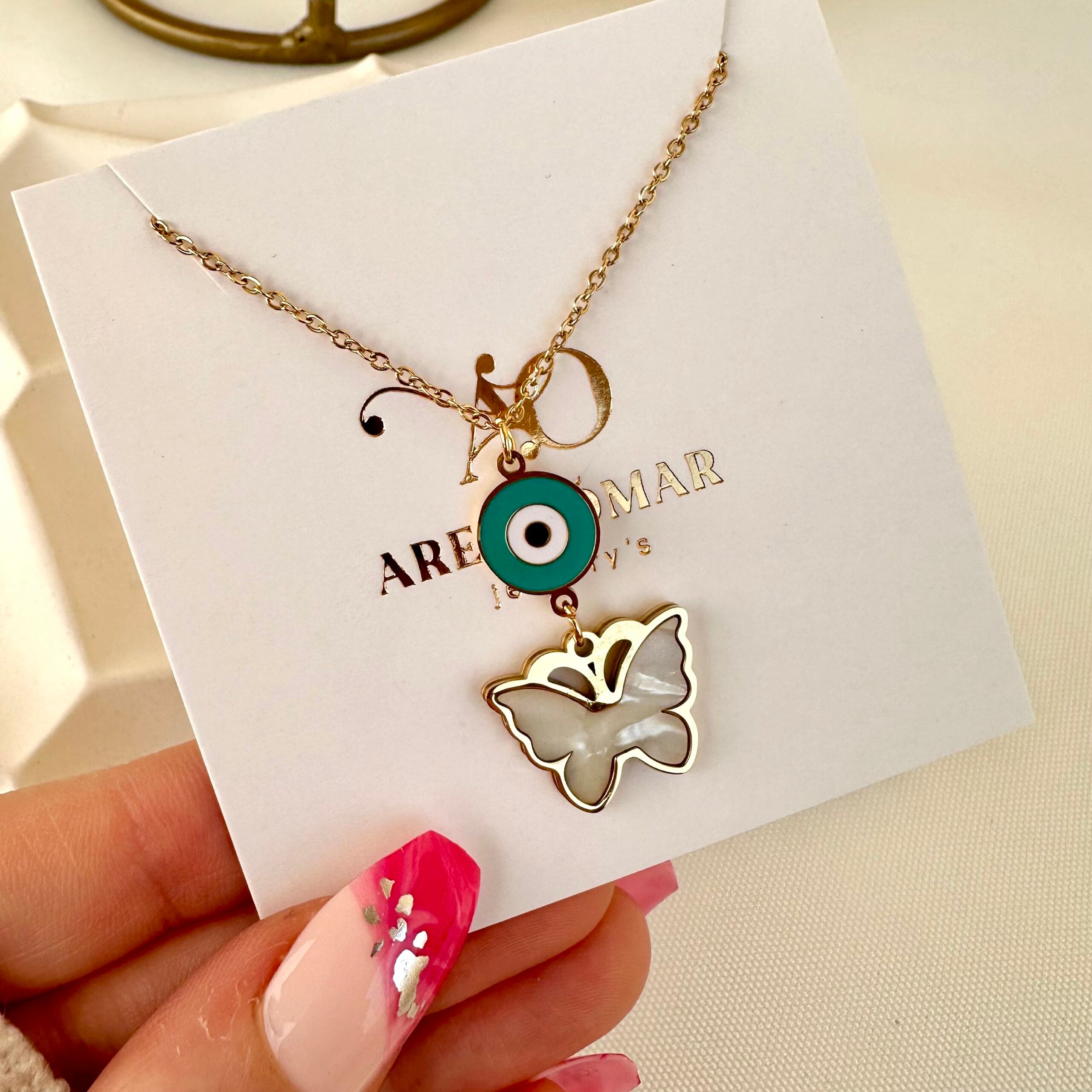 White butterfly & Evil necklace