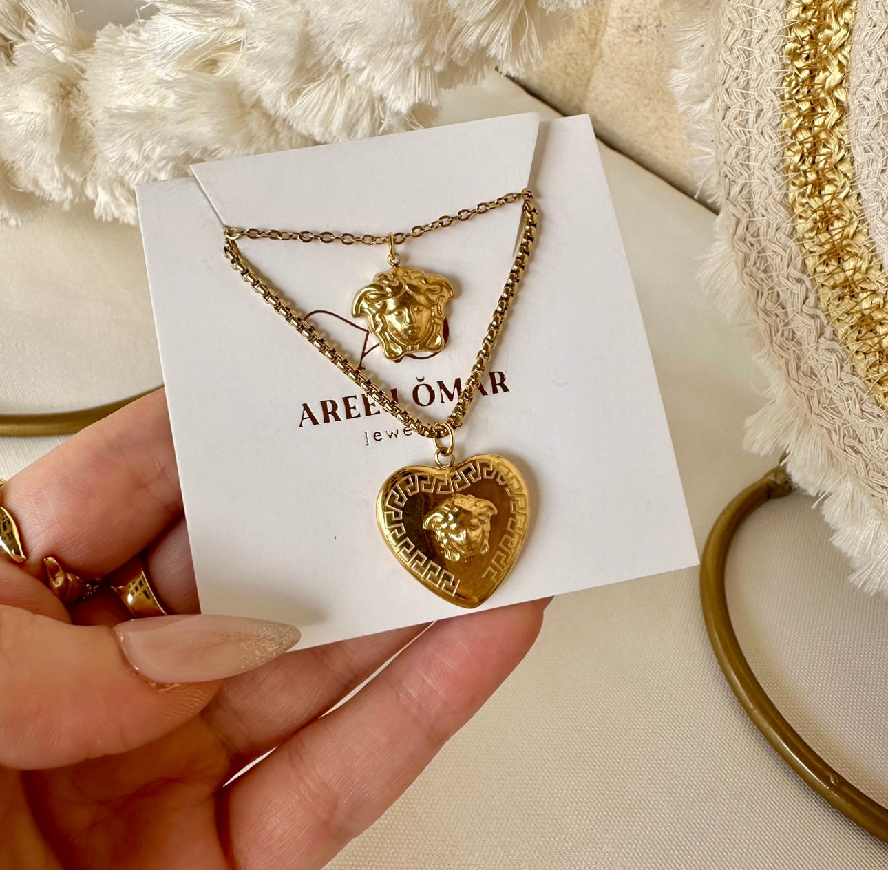 Layer Versace necklace