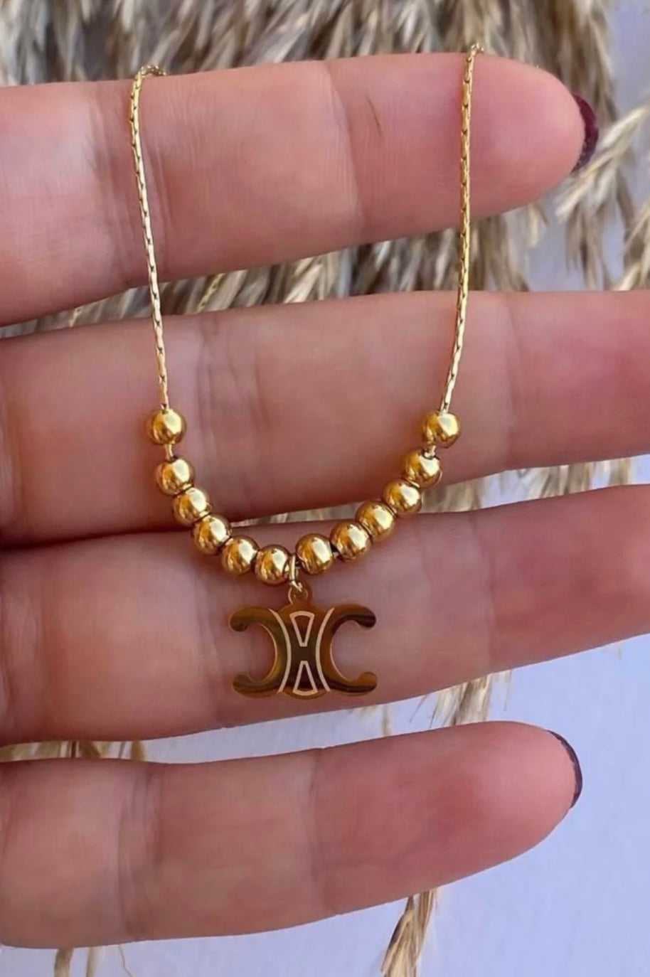 Chanel ball necklace