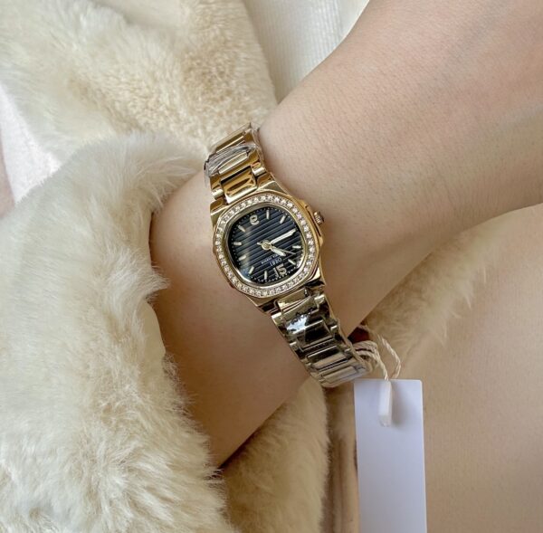 Gold & black zircon ibso watch