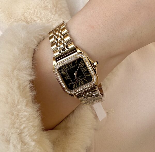 Gold & black zircon ibso watch