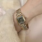 Gold & black square ibso watch