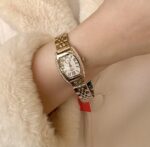 Gold and white zircon ibso watch