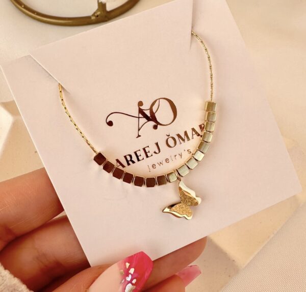 Butterfly ball necklace