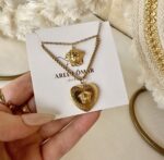 Layer Versace necklace