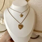 Layer Versace necklace